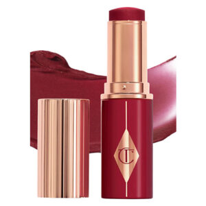 Charlotte Tilbury  - Unreal Lip + Cheek Glow Blush Stick with Hyaluronic Acid  Tono: Berry Glow