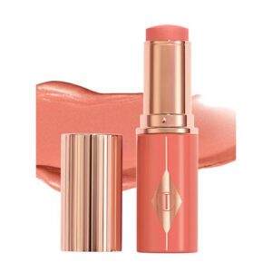 Charlotte Tilbury  - Unreal Lip + Cheek Glow Blush Stick with Hyaluronic Acid  Tono: Peachy Glow