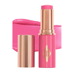 Charlotte Tilbury  - Unreal Lip + Cheek Glow Blush Stick with Hyaluronic Acid  Tono: Pinky Glow